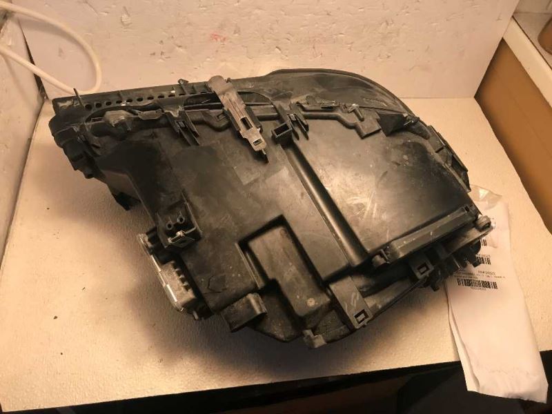 Left headlamp lens/housing used genuine OEM BMW 750I 2009-2012