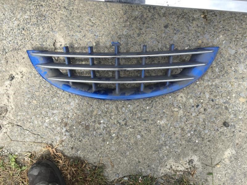 Grille used genuine OEM Chrysler PT Cruiser 2001-2005