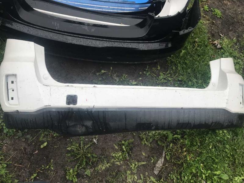 Rear bumper cover used genuine OEM Subaru Outback 2010-2014