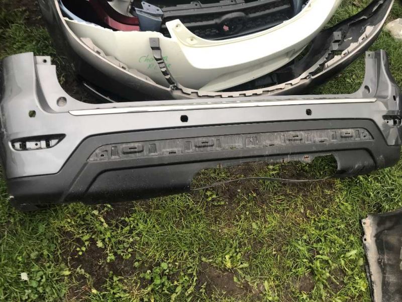Defensa (parachoques) trasera usada original (OEM) Nissan Pathfinder 2013-2016