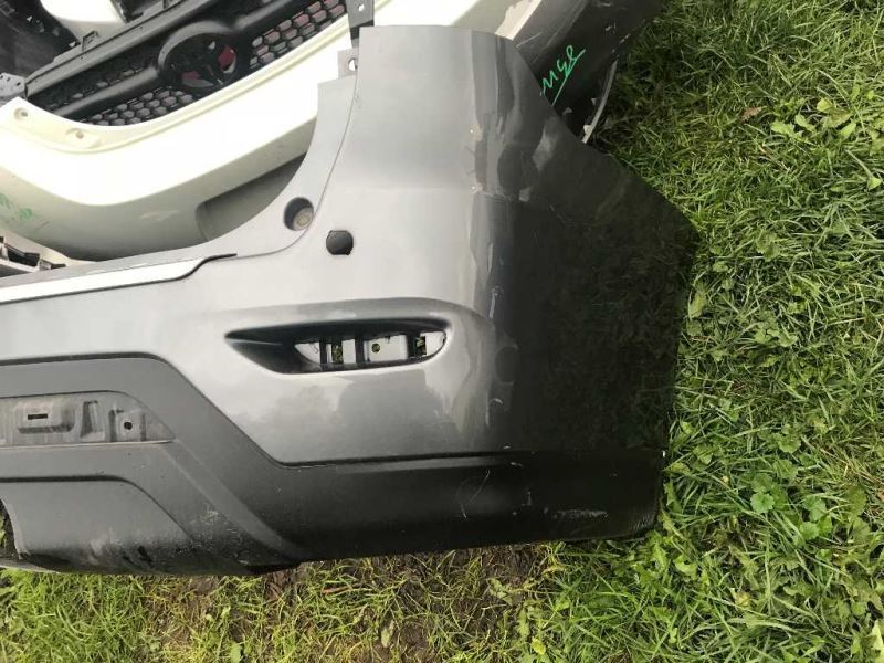 Defensa (parachoques) trasera usada original (OEM) Nissan Pathfinder 2013-2016