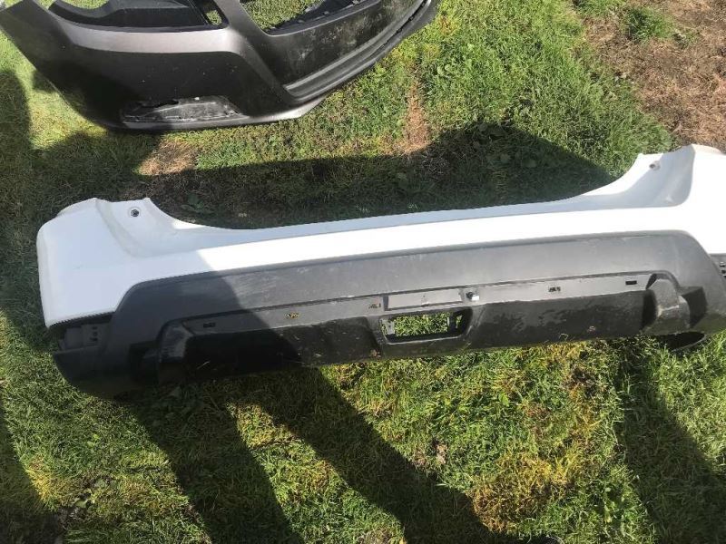 Rear bumper cover used genuine OEM Nissan Rogue 2017-2020