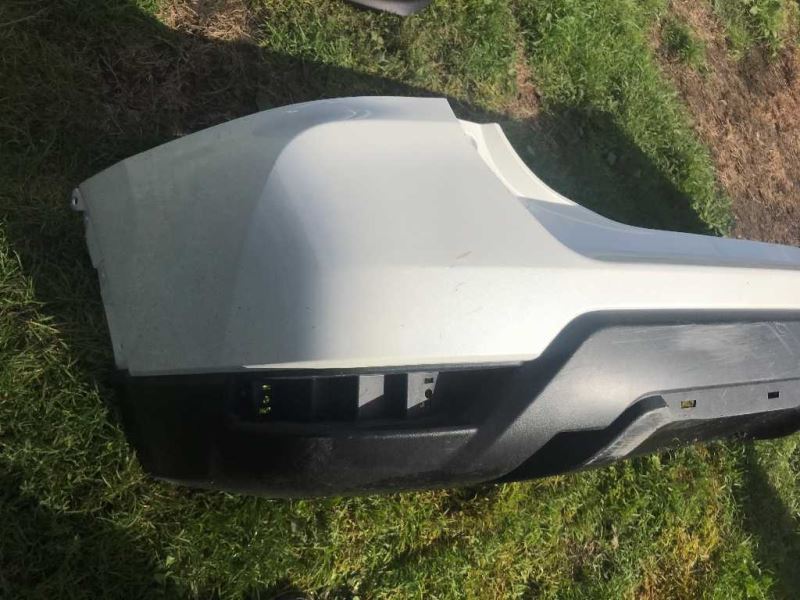 Rear bumper cover used genuine OEM Nissan Rogue 2017-2020