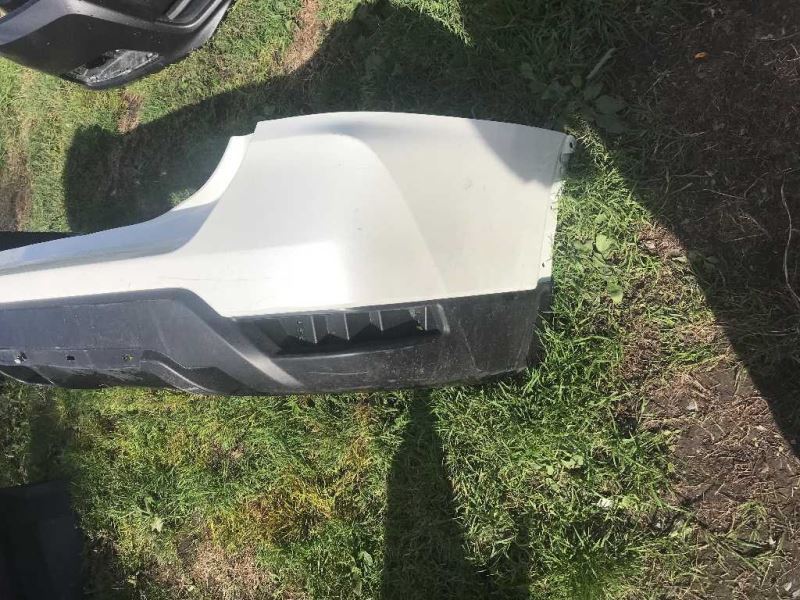 Rear bumper cover used genuine OEM Nissan Rogue 2017-2020