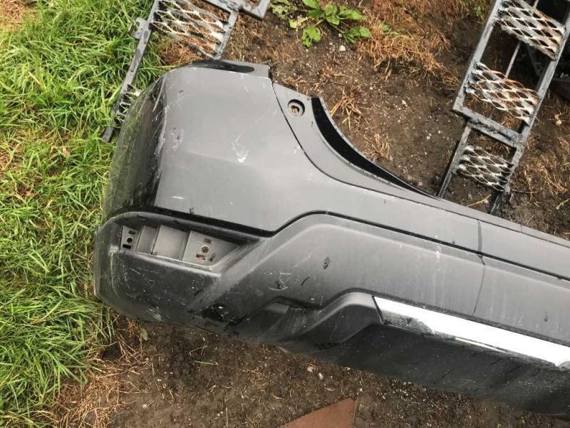 Rear bumper cover used genuine OEM Nissan Rogue 2017-2020
