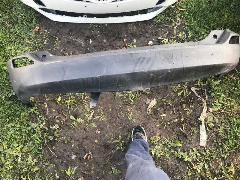Rear bumper cover used genuine OEM Toyota RAV4 2013-2015