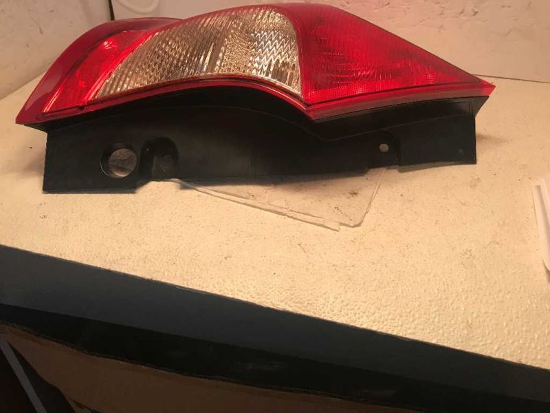 Left taillamp assembly used genuine OEM Nissan Versa Note 2014-2019