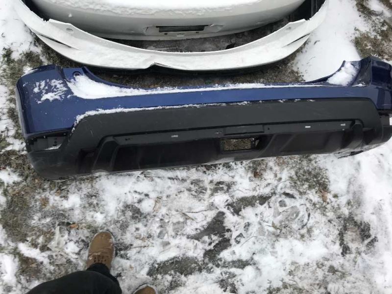 Rear bumper cover used genuine OEM Nissan Rogue 2017-2020