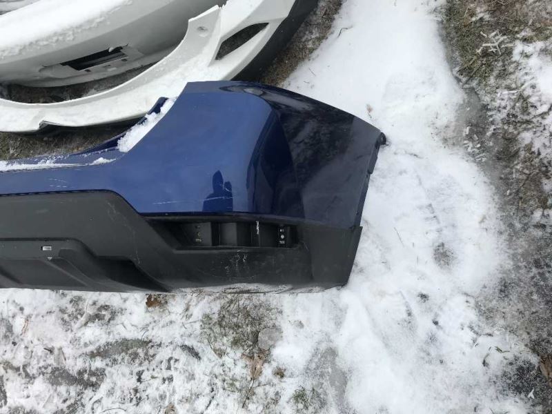 Rear bumper cover used genuine OEM Nissan Rogue 2017-2020