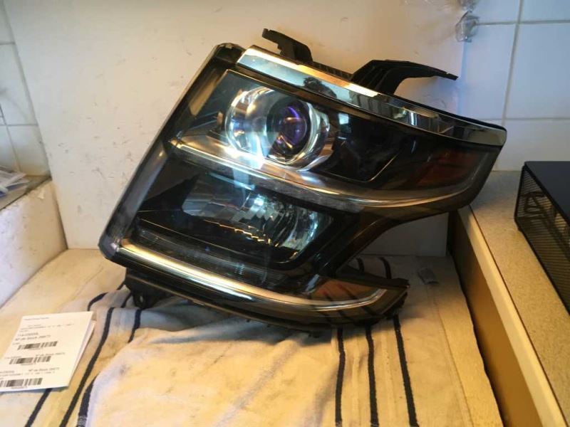 Headlamp Assembly used genuine OEM Chevrolet Tahoe 2015-2020