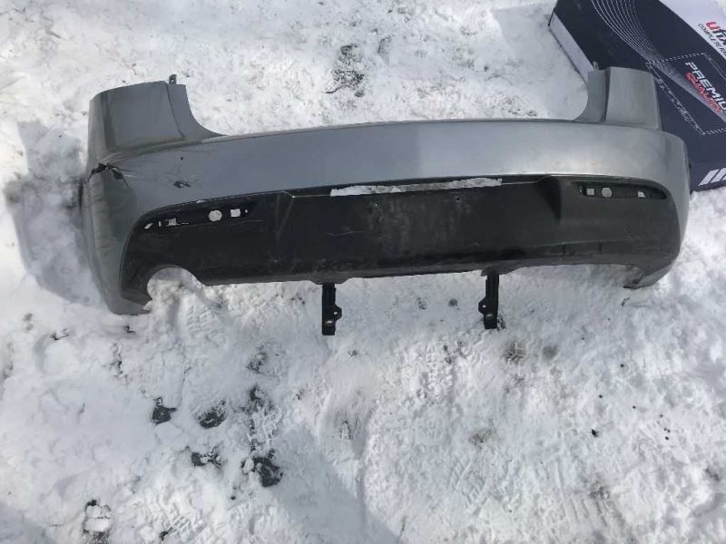 Rear bumper cover used genuine OEM Mazda 3 2010-2011