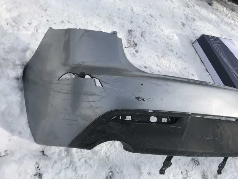 Rear bumper cover used genuine OEM Mazda 3 2010-2011