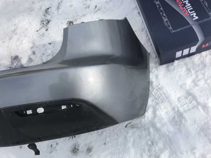 Rear bumper cover used genuine OEM Mazda 3 2010-2011