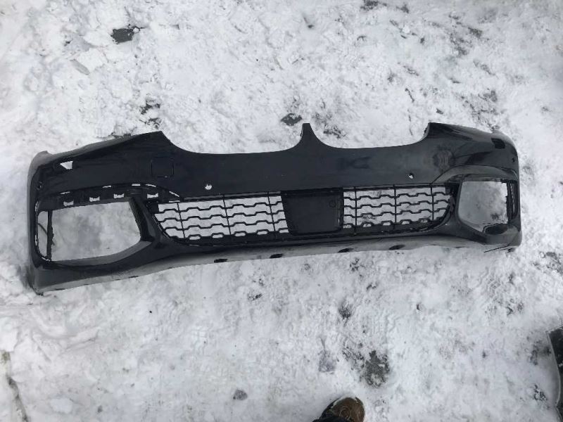 Front bumper cover used genuine OEM BMW 740I 2016-2019