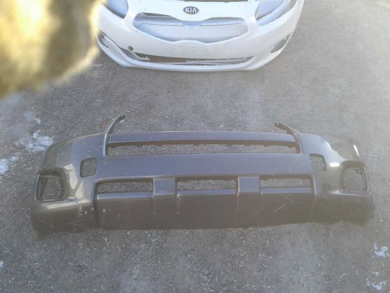Front bumper cover used genuine OEM Toyota RAV4 2009-2012