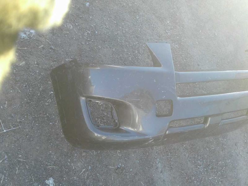 Front bumper cover used genuine OEM Toyota RAV4 2009-2012