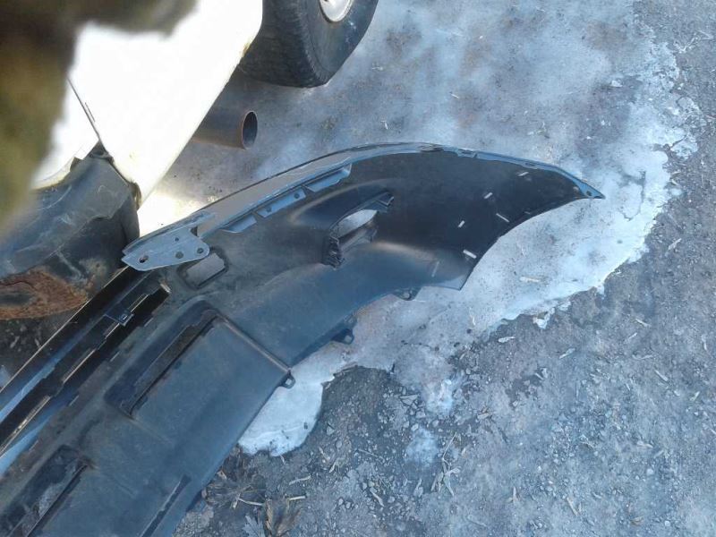 Front bumper cover used genuine OEM Toyota RAV4 2009-2012