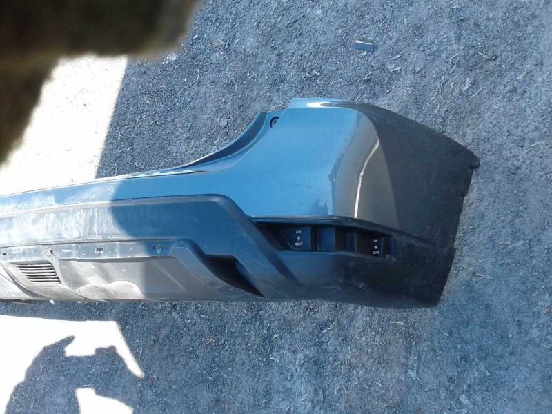 Rear bumper cover used genuine OEM Nissan Rogue 2017-2020