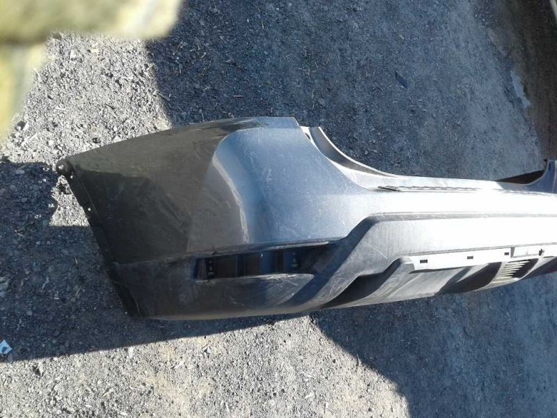 Rear bumper cover used genuine OEM Nissan Rogue 2017-2020