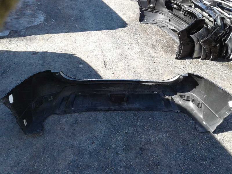 Rear bumper cover used genuine OEM Nissan Rogue 2017-2020