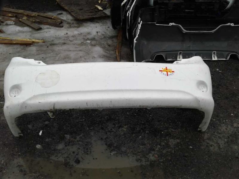 Rear bumper cover used genuine OEM Toyota Corolla 2009-2010