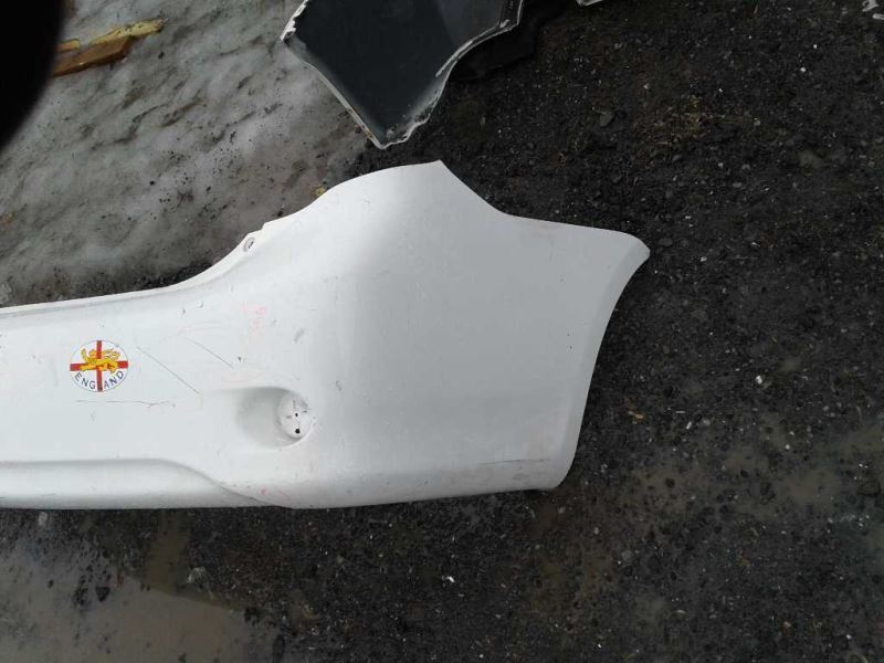 Rear bumper cover used genuine OEM Toyota Corolla 2009-2010