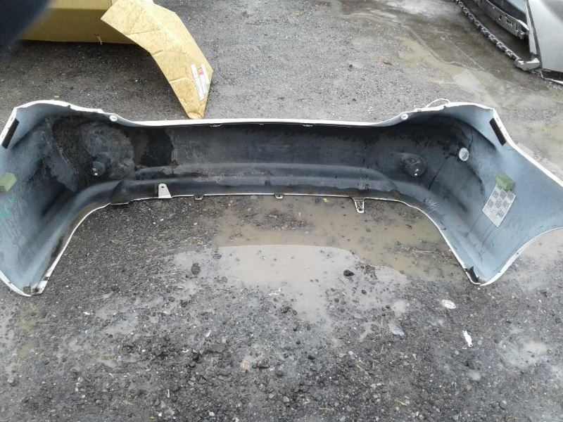 Rear bumper cover used genuine OEM Toyota Corolla 2009-2010