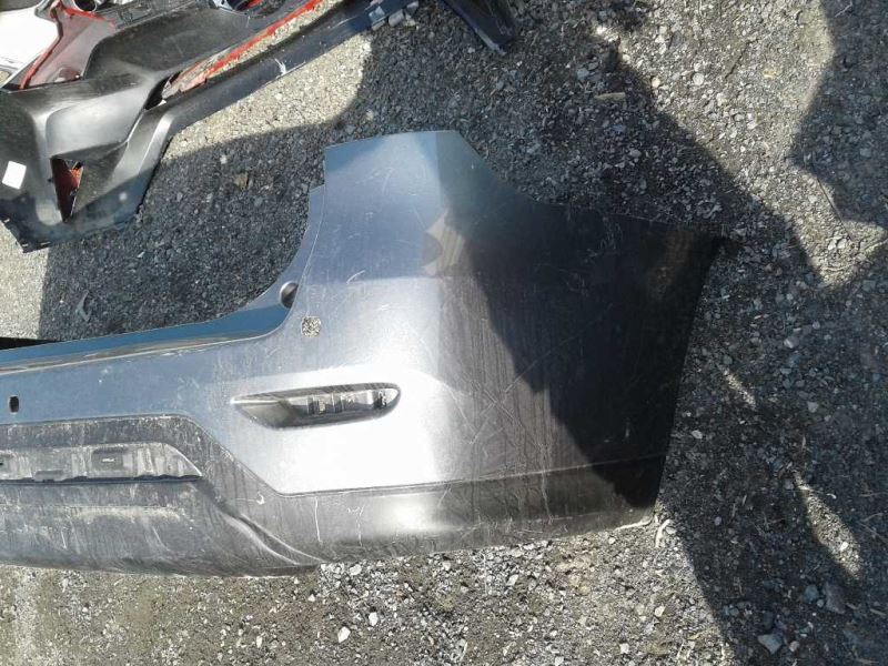 Rear bumper cover used genuine OEM Nissan Pathfinder 2013-2016