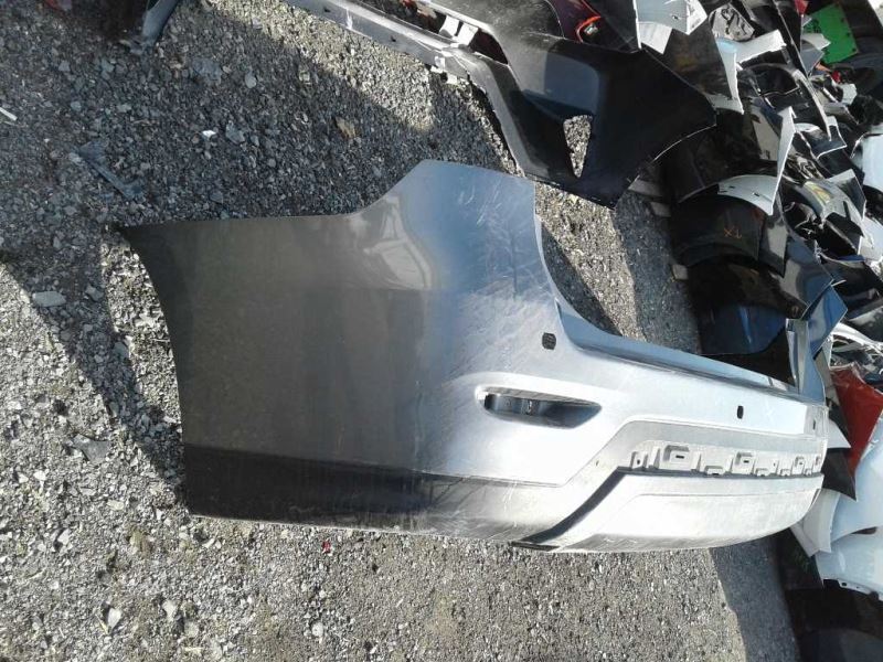 Rear bumper cover used genuine OEM Nissan Pathfinder 2013-2016