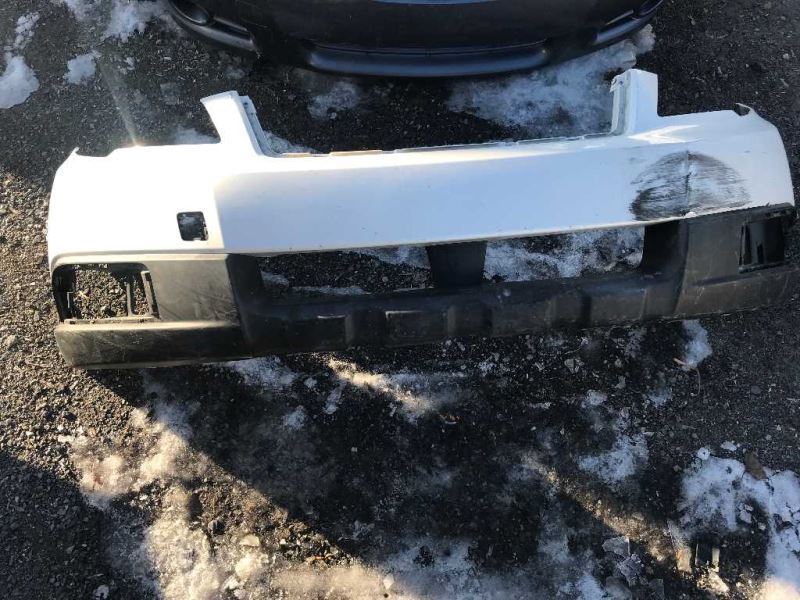 Front bumper cover used genuine OEM Subaru Outback 2010-2012