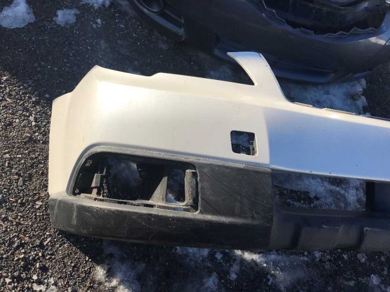 Front bumper cover used genuine OEM Subaru Outback 2010-2012