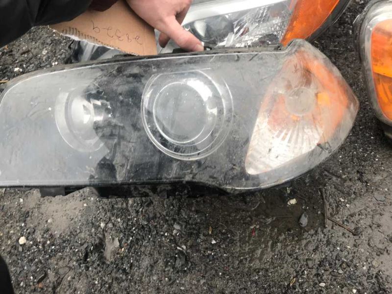 Left headlamp assembly composite used genuine OEM BMW X3 2004-2006