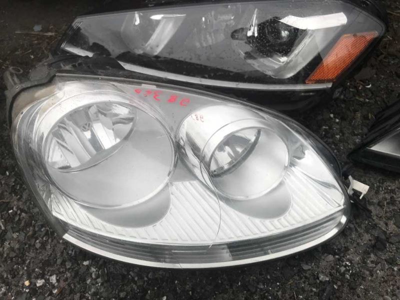 Right headlamp assembly composite used genuine OEM Volkswagen Jetta 2005-2010