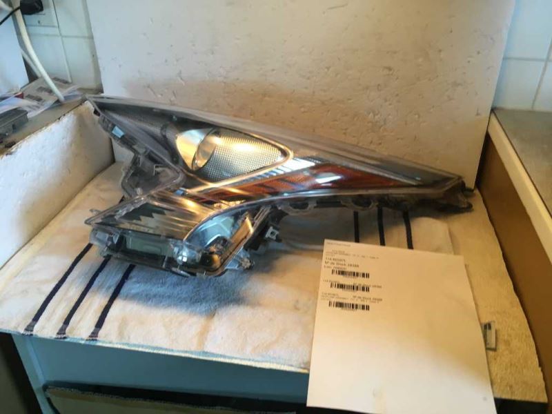 Left headlamp lens/housing used genuine OEM Toyota Prius V 2015-2018