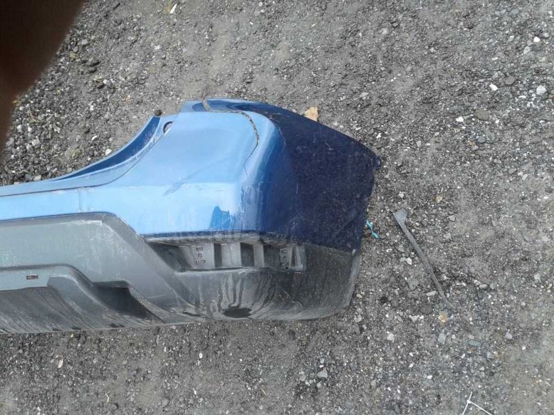 Defensa (parachoques) trasera usada original (OEM) Nissan Rogue 2017-2020