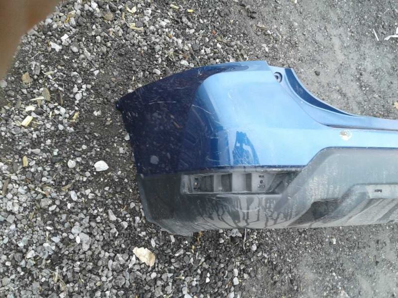 Defensa (parachoques) trasera usada original (OEM) Nissan Rogue 2017-2020