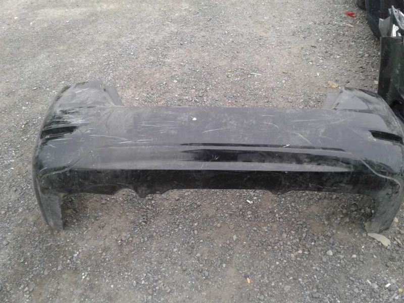 Rear bumper cover used genuine OEM Nissan Sentra 2013-2015