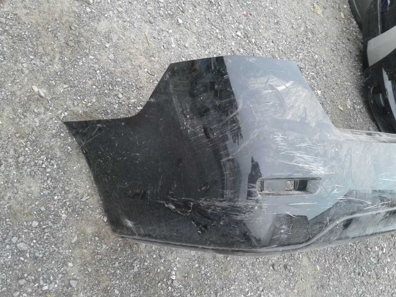 Rear bumper cover used genuine OEM Nissan Sentra 2013-2015