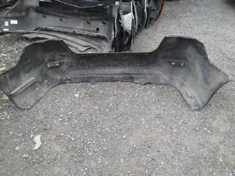 Rear bumper cover used genuine OEM Nissan Sentra 2013-2015