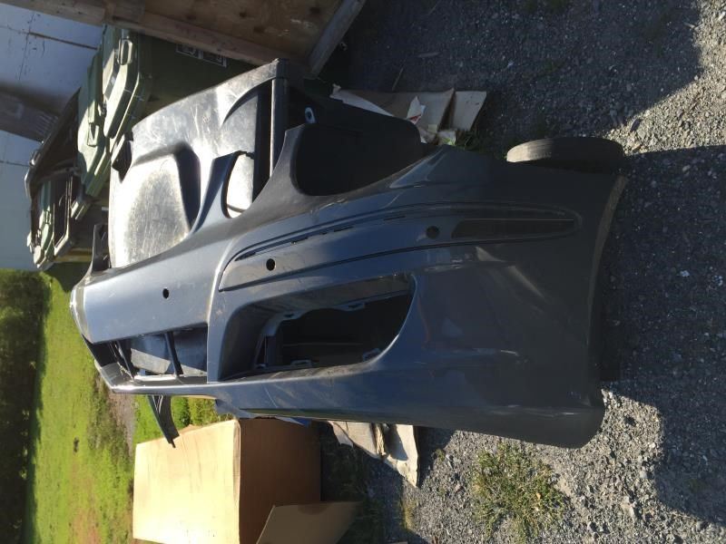 Front bumper cover used genuine OEM Mercedes-Benz E320 2007-2009