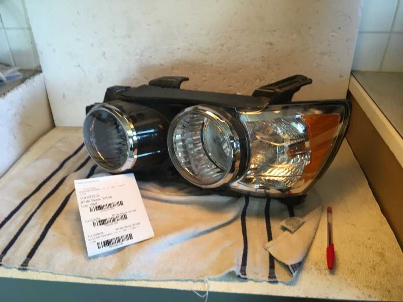Left headlamp assembly composite used genuine OEM Chevrolet Sonic 2012-2016