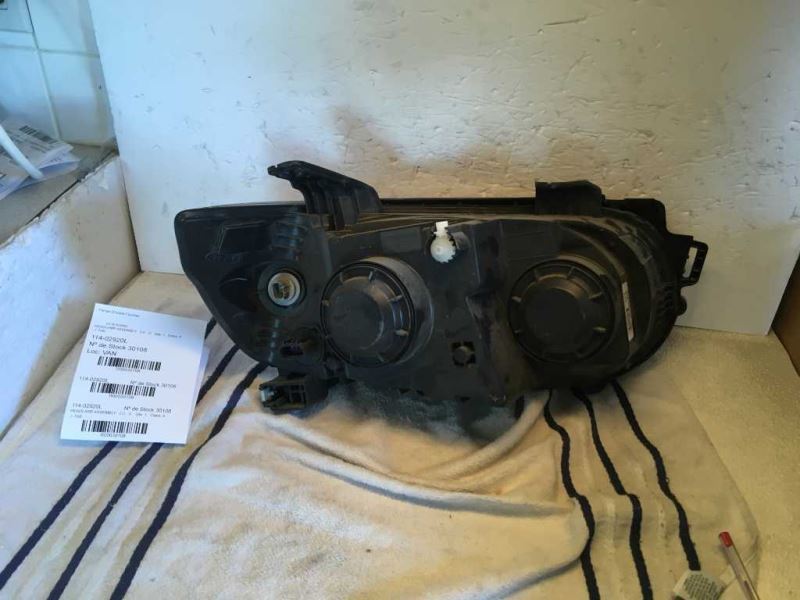 Left headlamp assembly composite used genuine OEM Chevrolet Sonic 2012-2016
