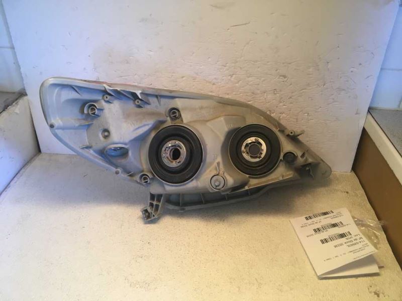 Left headlamp assembly composite used genuine OEM Toyota Matrix 2003-2008