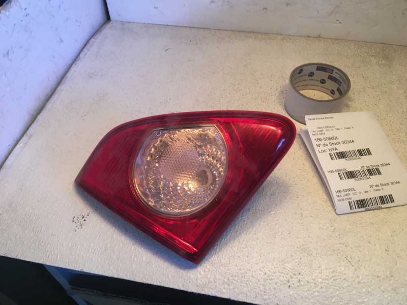 Left taillamp assembly inner used genuine OEM Toyota Corolla 2009-2010