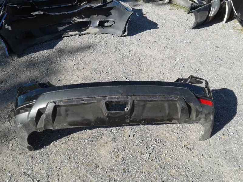 Rear bumper cover used genuine OEM Nissan Rogue 2017-2020