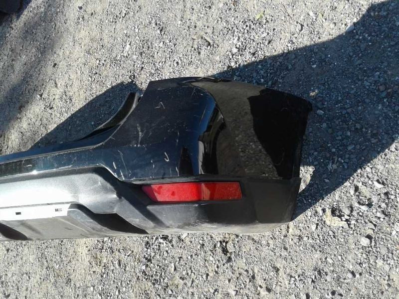 Rear bumper cover used genuine OEM Nissan Rogue 2017-2020