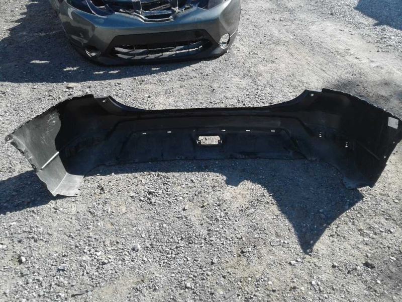 Rear bumper cover used genuine OEM Nissan Rogue 2017-2020