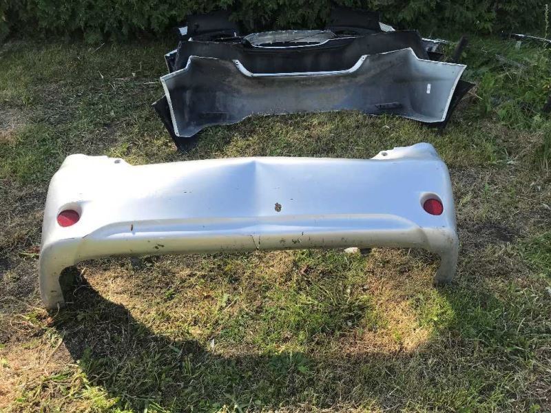 Rear bumper cover used genuine OEM Toyota Corolla 2009-2010