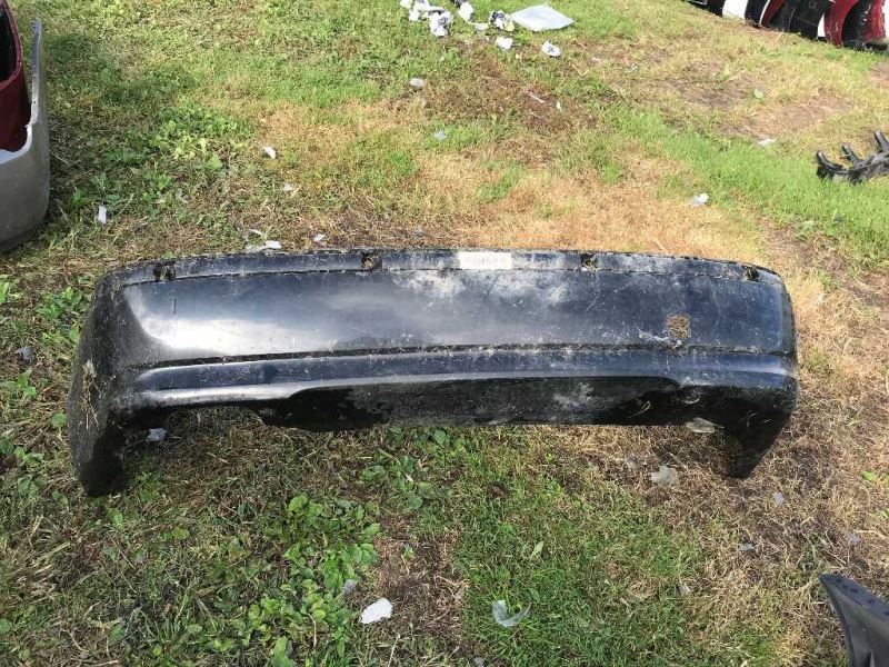 Rear bumper cover used genuine OEM BMW 325I 2002-2005