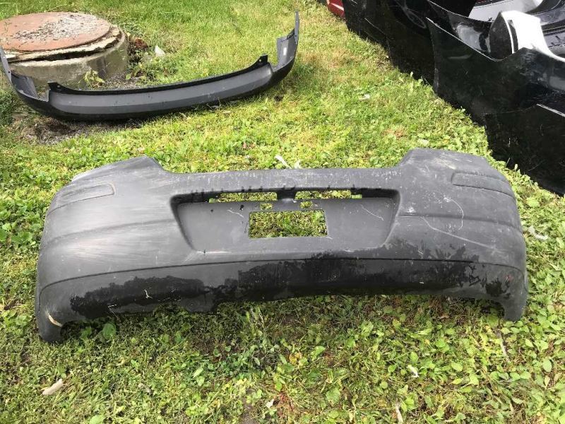 Rear bumper cover used genuine OEM Nissan Versa 2007-2012